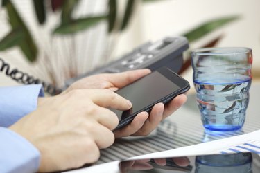 businessman is talking on phone, working with smart phone