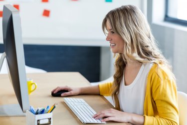 Beautiful woman working on computer