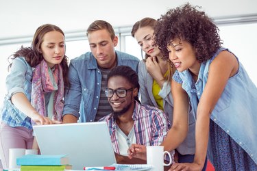 Fashion students working as a team