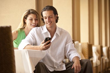 couple looking at smartphone