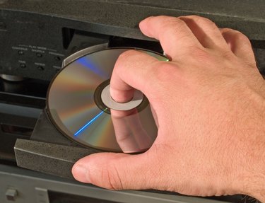 inserting dvd disk in player