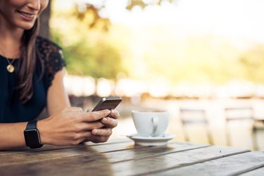 Woman texting on her smartphone