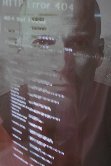 Man's portrait with computer code