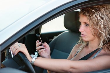 Reading SMS while driving car