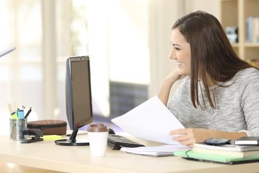 Student studying with a personal computer