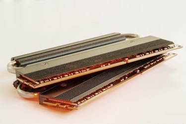 Two Sticks of RAM with a Red Glow