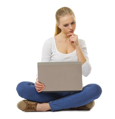 Worried girl with laptop