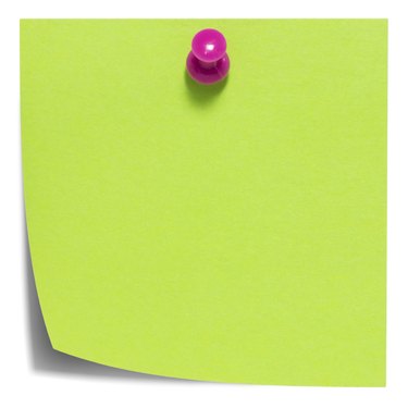 Green square sticky note, with a pink pin, isolated