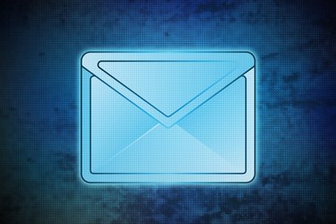 magic email on blue shiny pixel grid screen modern technology
