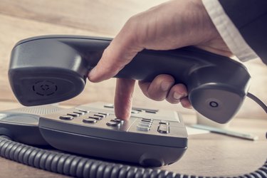 Closeup of businessman making a telephone call