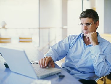 businessman using a laptop in an office