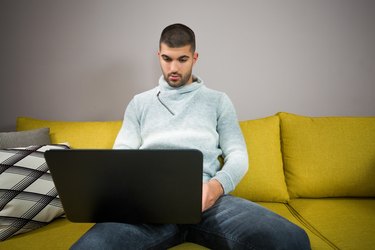 Young man with laptop