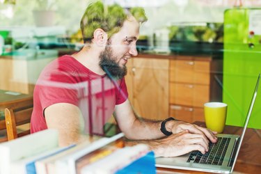 man using his laptop