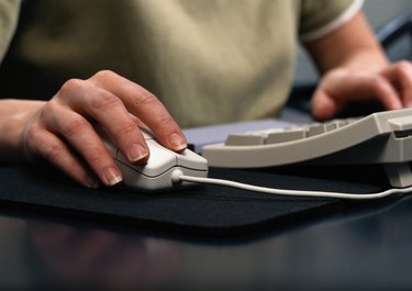 Close-Up of Hand on Mouse