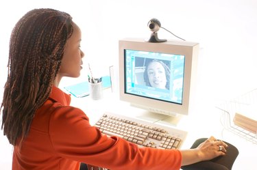 Woman working on computer in office