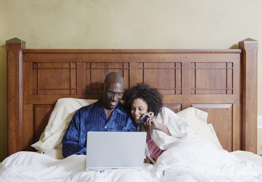 Couple looking at laptop