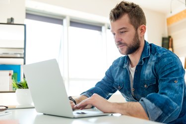 Young man working on laptop