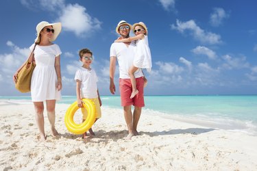 Family on a tropical beach vacation