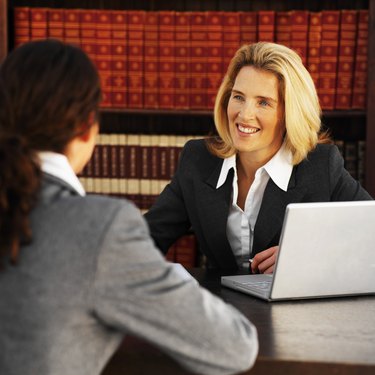 Close-up of two business colleagues having meeting