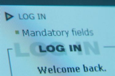 Close-up of a computer screen showing login details