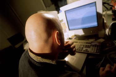 Young man working in front of computer