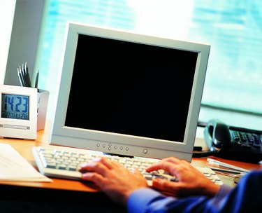 Person typing on a computer