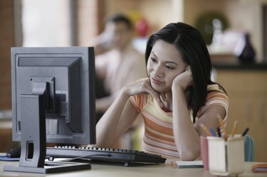 Asian businesswoman at desk