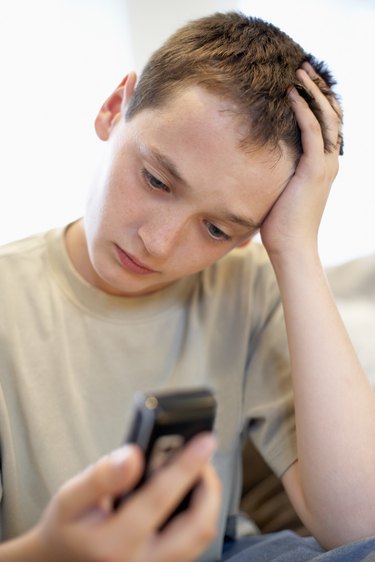 Boy with cell phone