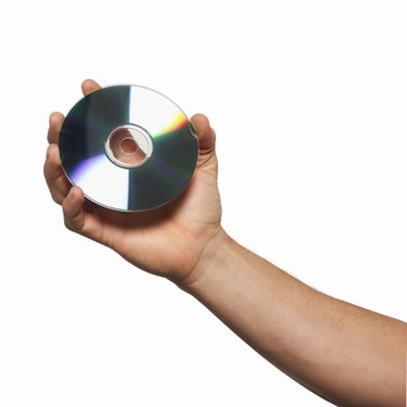 Close-up of man's holding cd