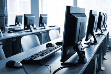 Empty computer lab with sunlight peering through