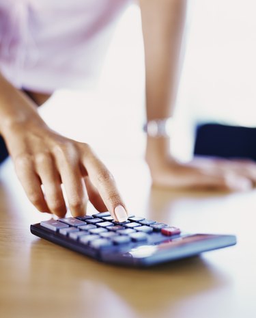 Woman with calculator