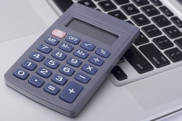 calculator on the laptop keyboard