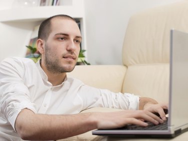 Young man working on laptop