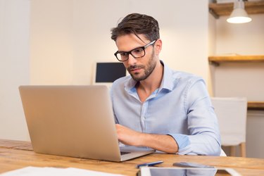 Businessman working on laptop