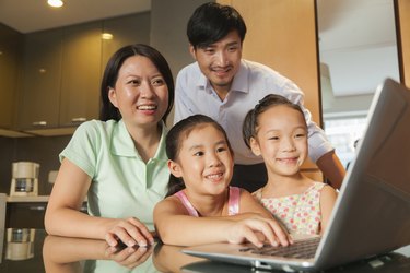 Family watching movie on the laptop