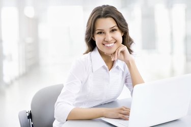 Business woman working on laptop