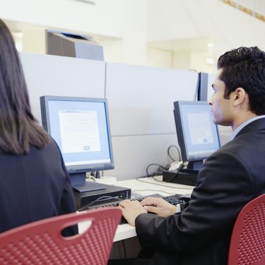 People working on computer stations