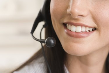 Close-up of woman with headset