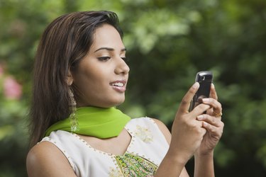 Woman using cellular phone