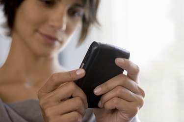 Woman holding personal organizer