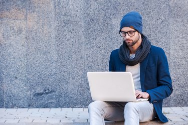 Surfing the net outdoors.