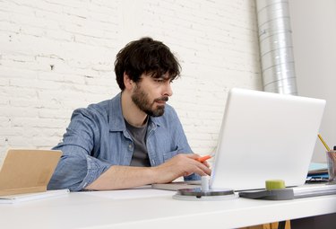 corporate portrait young hispanic hipster businessman working home office