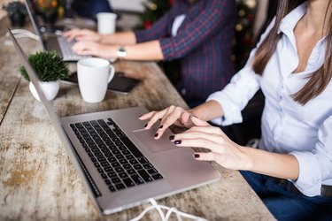 Young women working at home office or co-working space