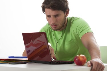 Student watching movie during classes