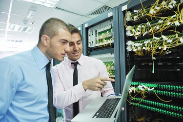 it engineers in network server room