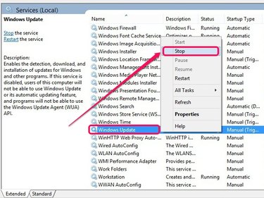The Windows Update service stops.