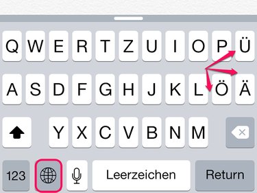 Tap the Globe icon to switch to the German keyboard.