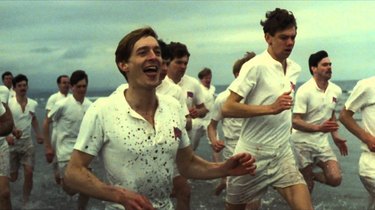 Still of Ian Charleson and Ben Cross running in Chariots of Fire.