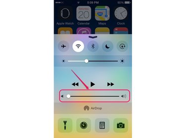 Adjust the volume through the Control Center.