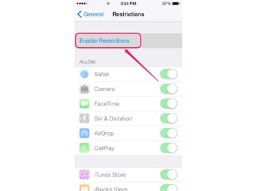 The option to turn on the Restrictions feature is at the top of the screen.